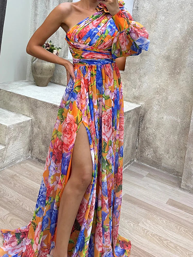 One-shoulder wave maxi dress styled as a statement look